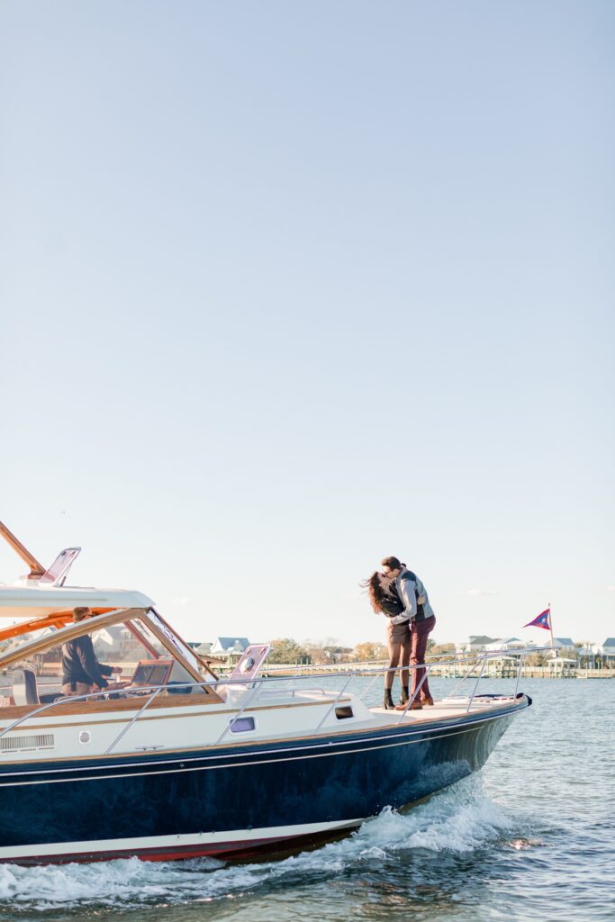 Engaged couple on boat in Charleston, South Carolina; Daniel Island Yacht Club