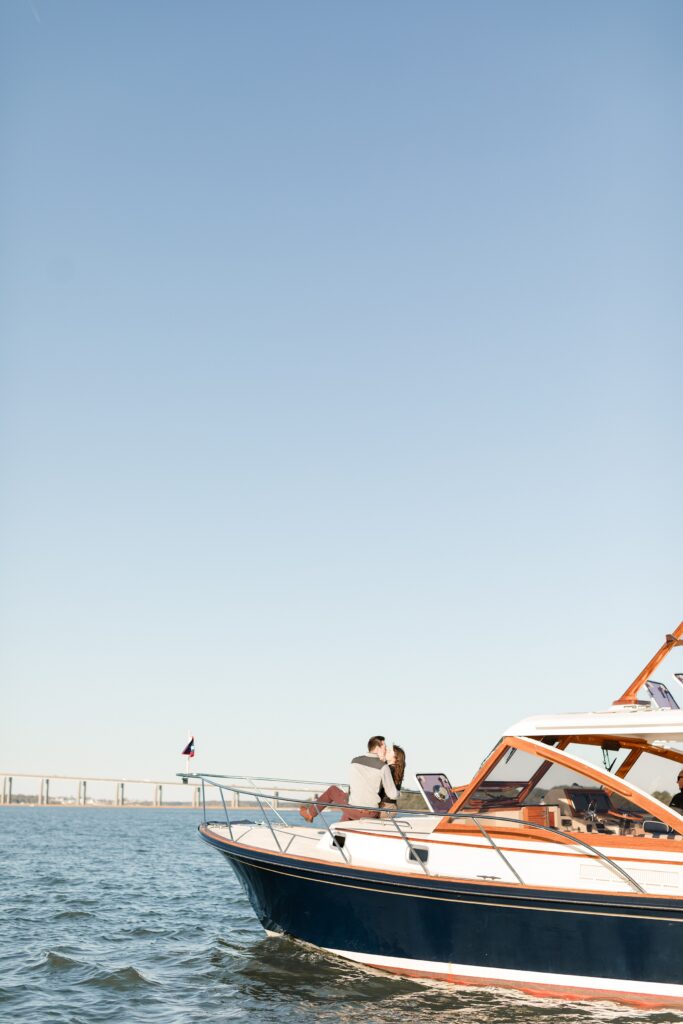 Engaged couple on boat in Charleston, South Carolina; Daniel Island Yacht Club